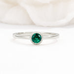 Minimalist Round Cut Bezel Set Solitaire Emerald Engagement Ring - Additional view