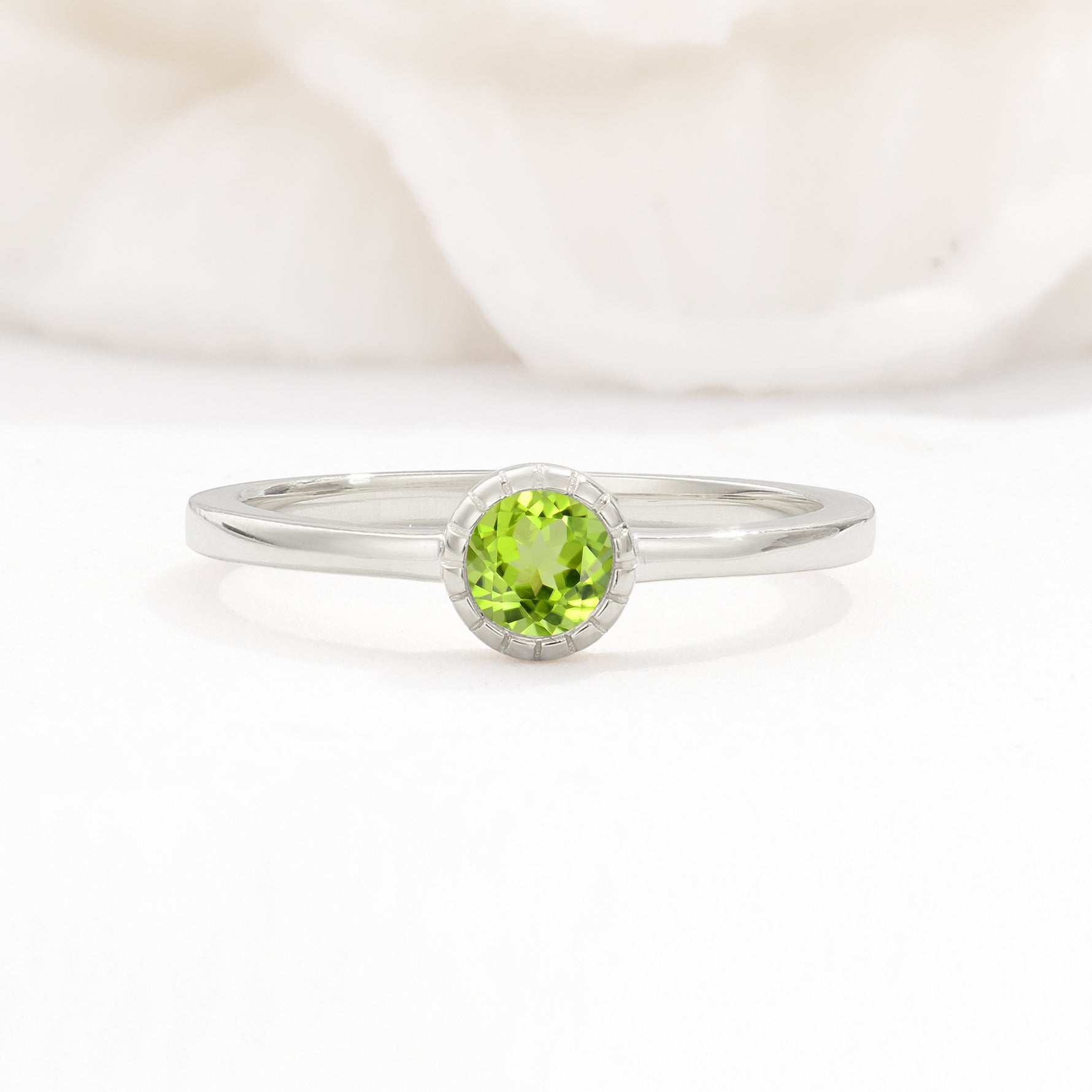 Minimalist Round Cut Bezel Set Solitaire Peridot Engagement Ring - Additional view