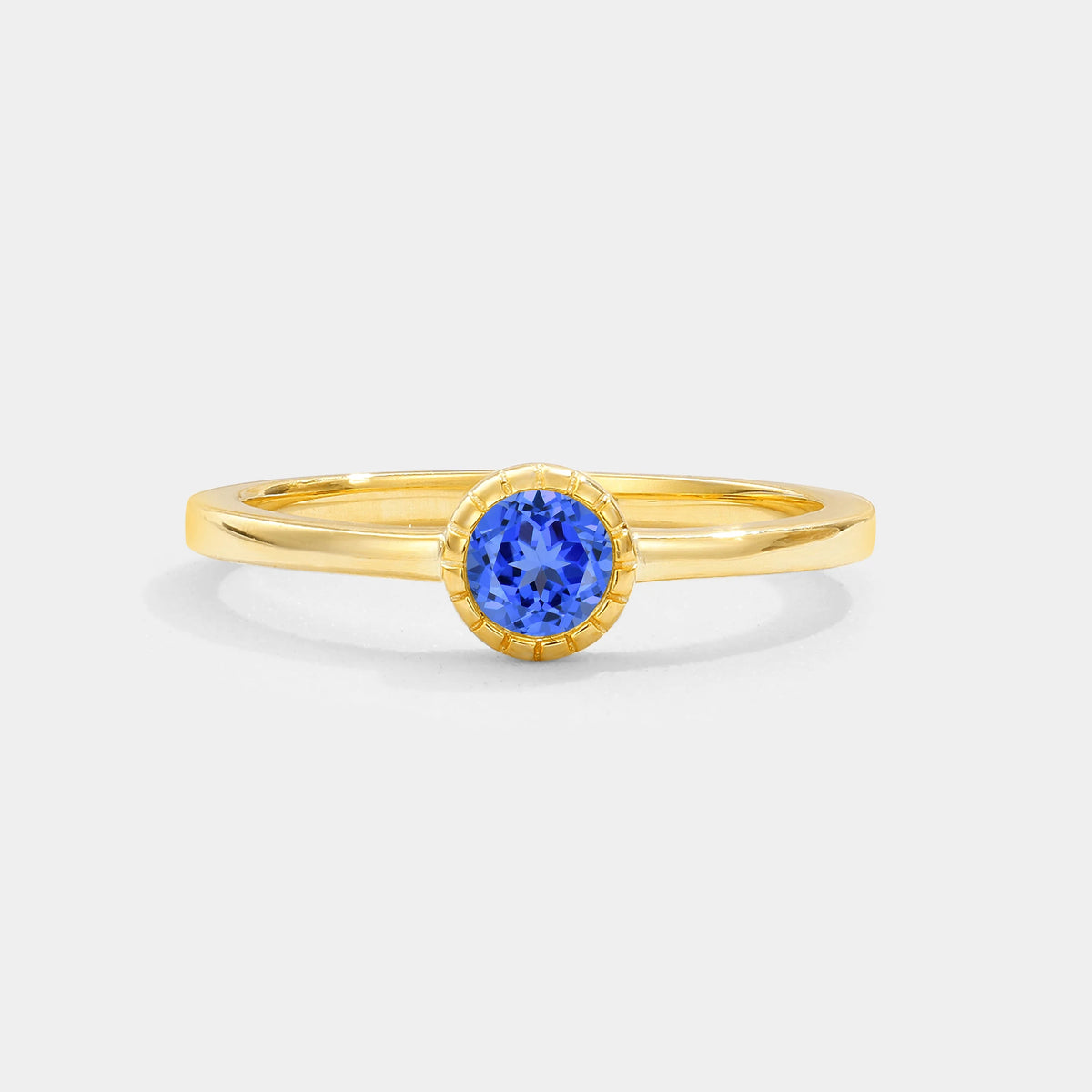 Minimalist Round Cut Bezel Set Solitaire Sapphire Engagement Ring