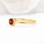 Minimalist Round Cut Bezel Set Solitaire Garnet Engagement Ring - Additional view