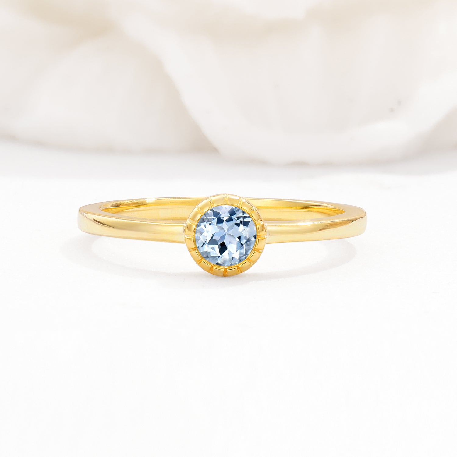 Minimalist Round Cut Bezel Set Solitaire Aquamarine Engagement Ring
