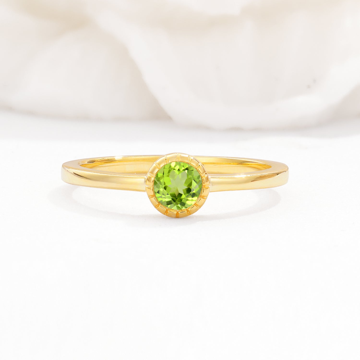 Minimalist Round Cut Bezel Set Solitaire Peridot Engagement Ring