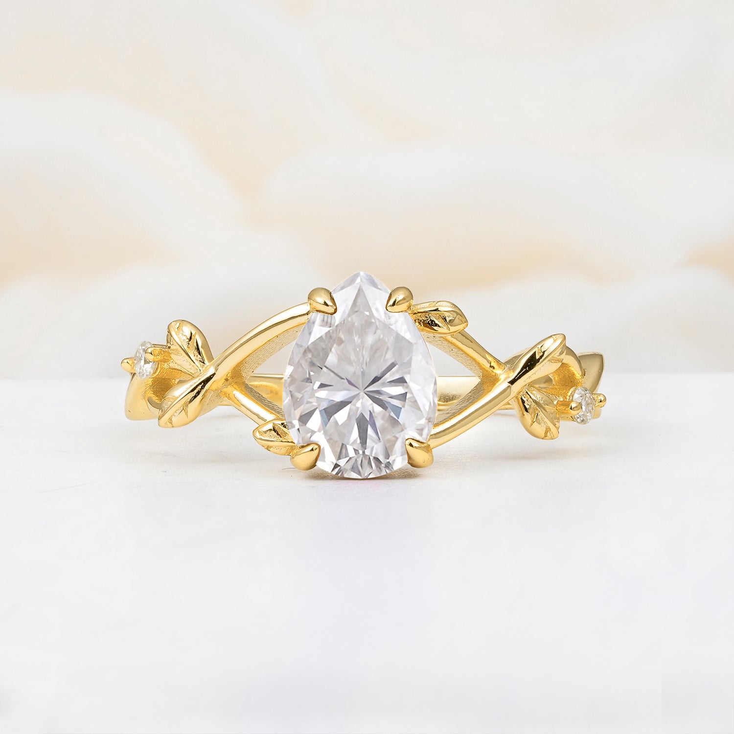 Nature Inspired Four Prong Pear Moissanite Leaf Engagement Ring