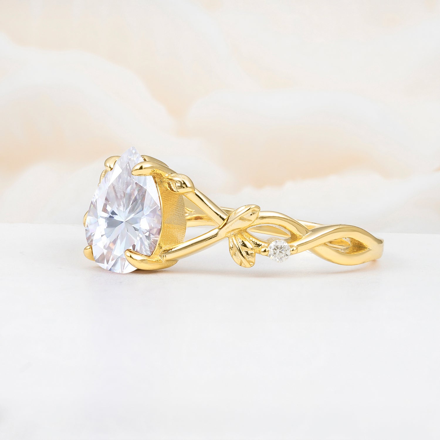Nature Inspired Four Prong Pear Moissanite Leaf Engagement Ring