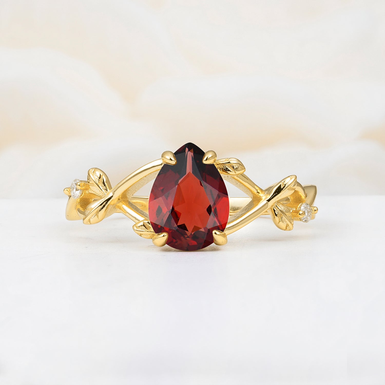 Nature Inspired Four Prong Pear Garnet Leaf Engagement Ring