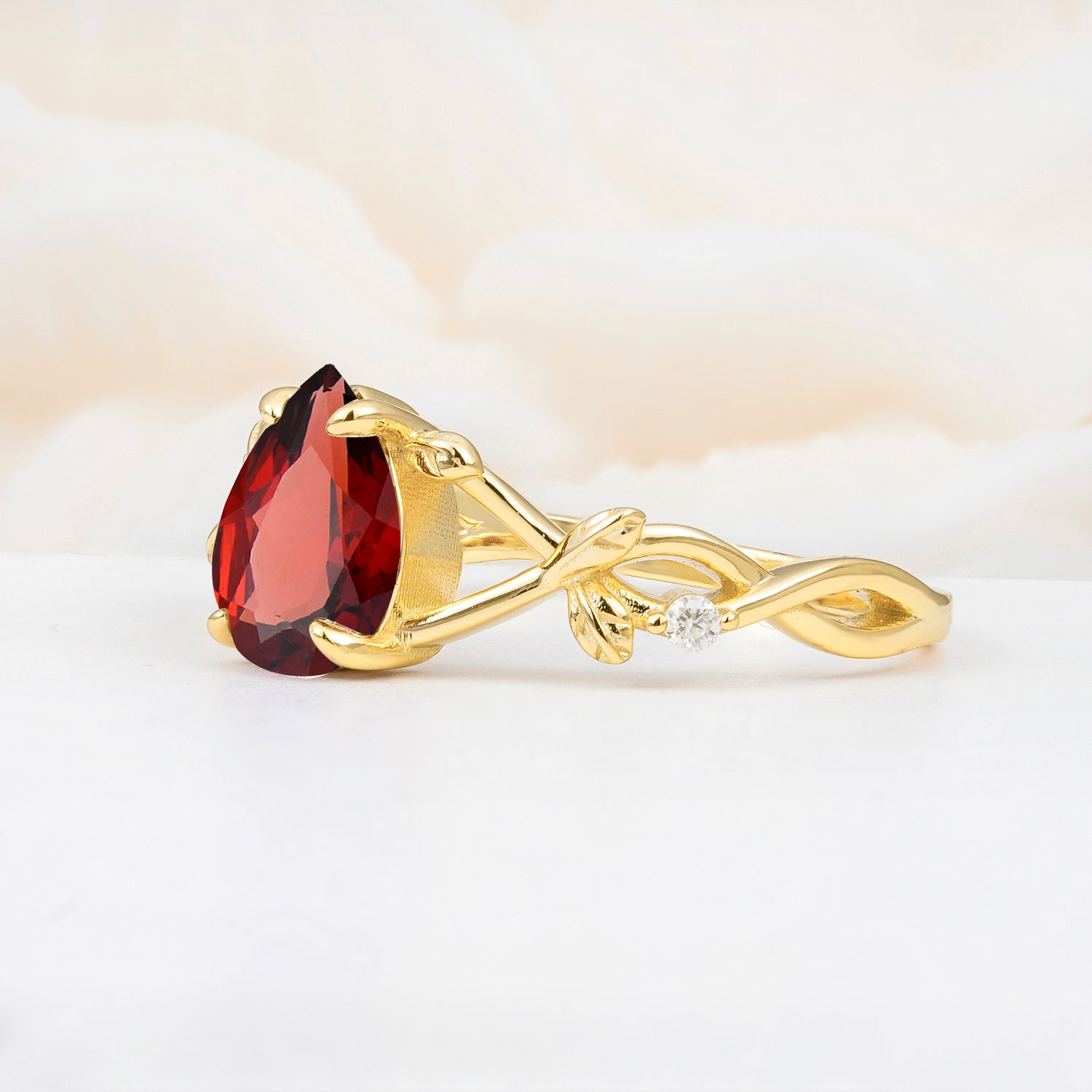 Nature Inspired Four Prong Pear Garnet Leaf Engagement Ring