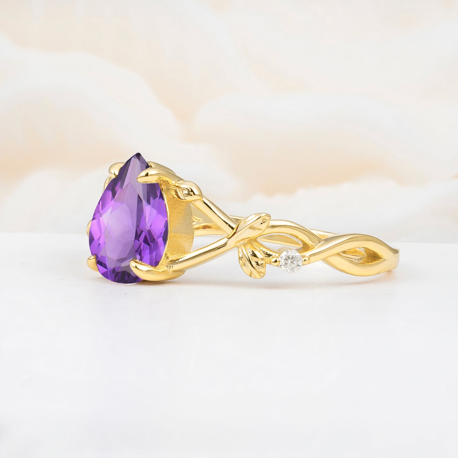 Nature Inspired Four Prong Pear Amethyst Leaf Engagement Ring