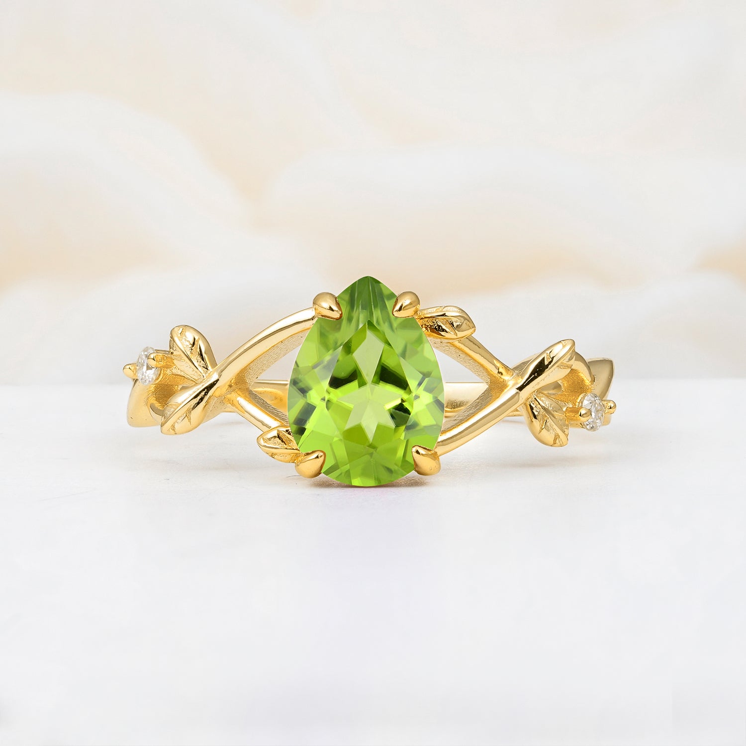 Nature Inspired Four Prong Pear  Peridot Leaf Engagement Ring