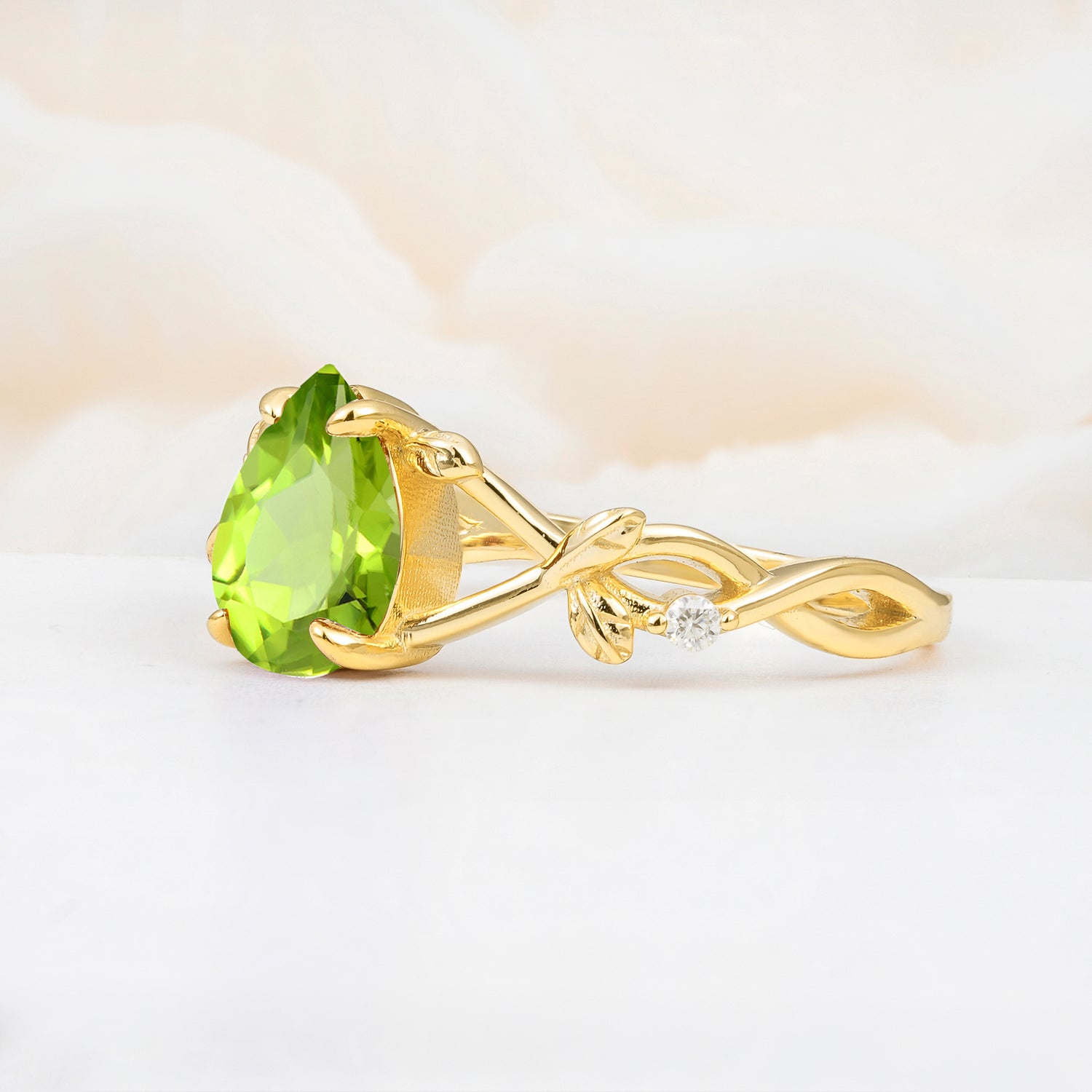 Nature Inspired Four Prong Pear  Peridot Leaf Engagement Ring