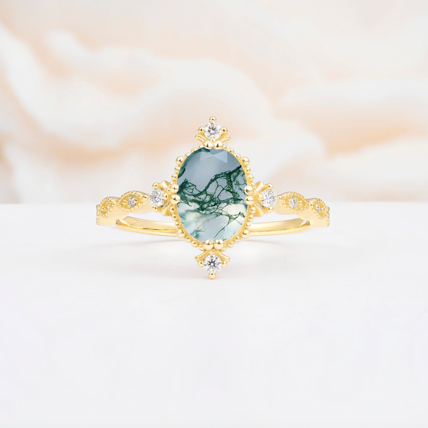 Luxurious, Sparkling Oval-Cut Moss Agate Engagement Rings