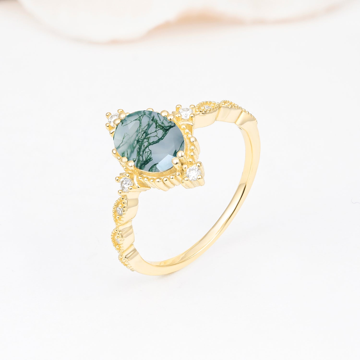 Luxurious, Sparkling Oval-Cut Moss Agate Engagement Rings