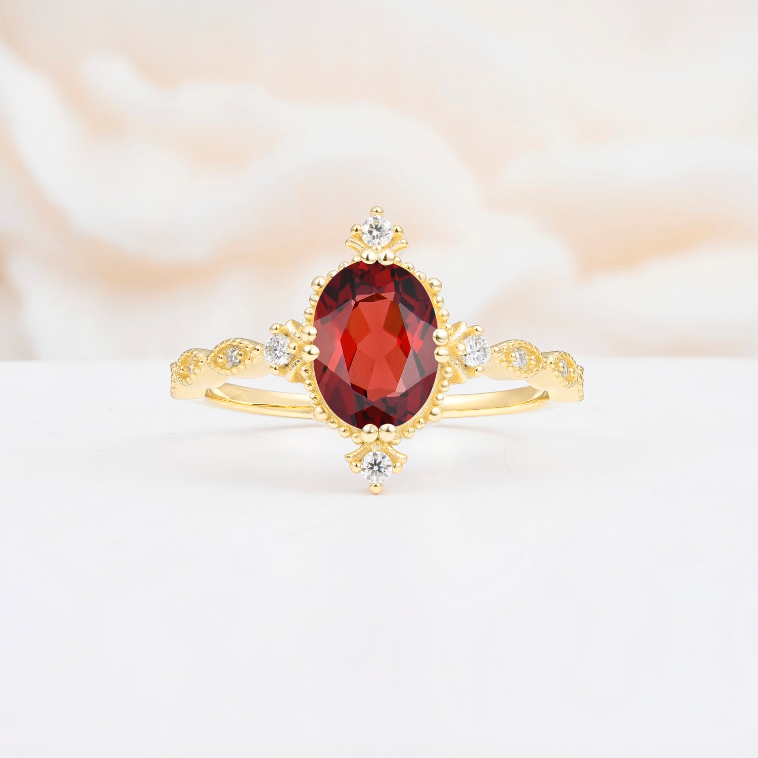 Luxurious, Sparkling Oval-Cut Garnet Engagement Rings