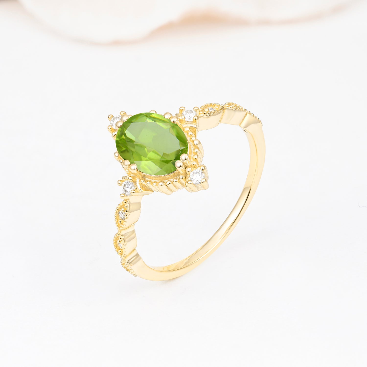 Luxurious, Sparkling Oval-Cut Peridot Engagement Rings