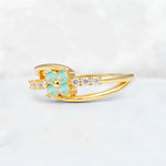 Fire Opal Floral Cluster Round Cut Engagement Ring with Accent Stones - Additional view