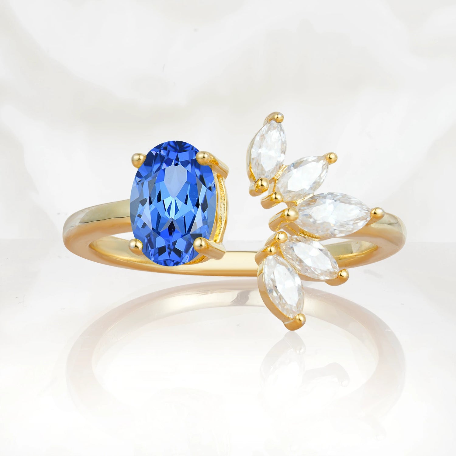 Unique Oval Sapphire Engagement Ring with Marquise Side Stones