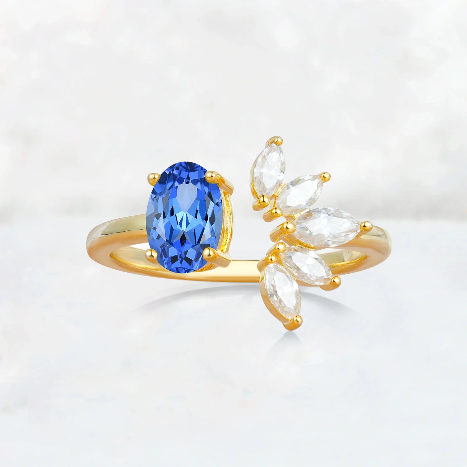 Unique Oval Sapphire Engagement Ring with Marquise Side Stones