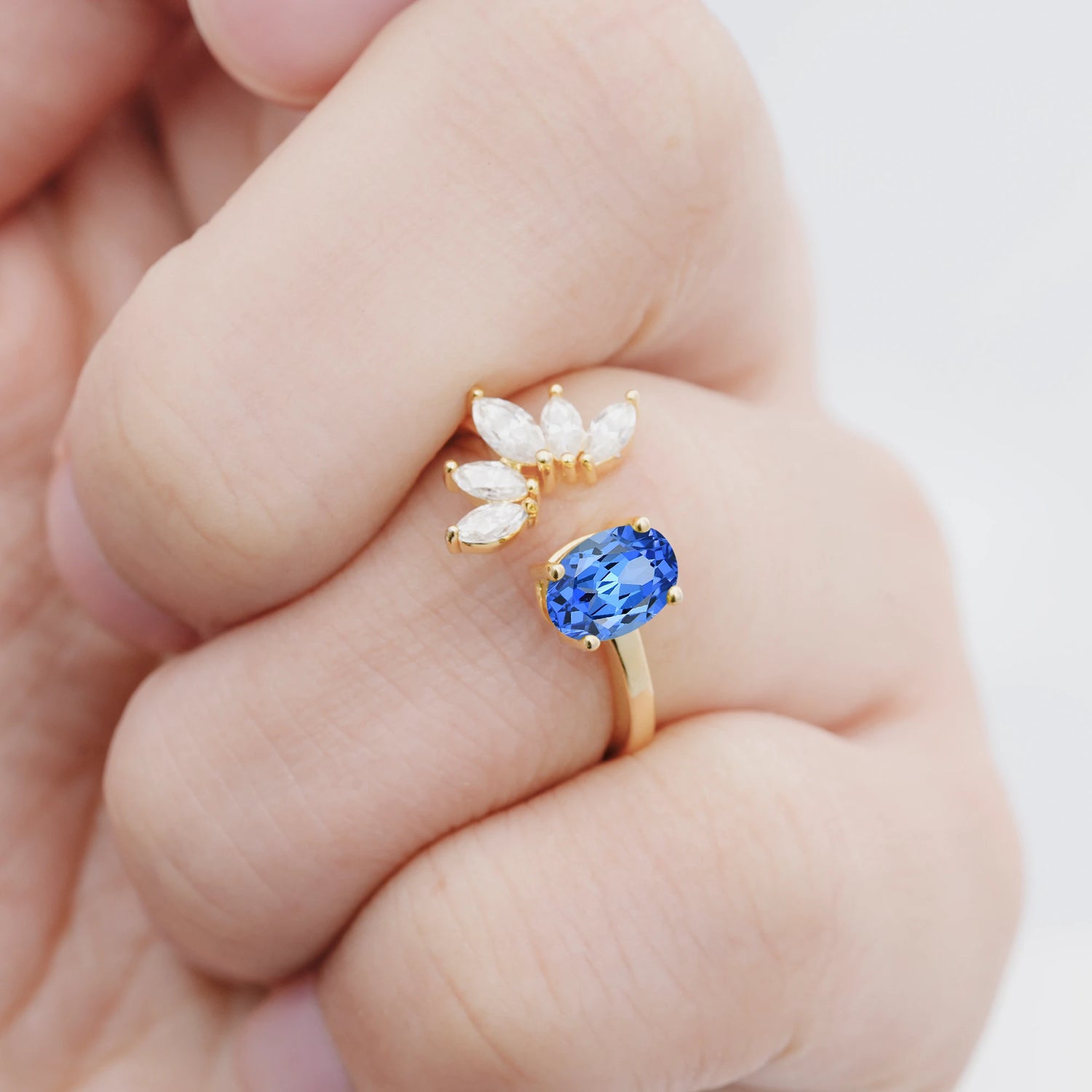 Unique Oval Sapphire Engagement Ring with Marquise Side Stones