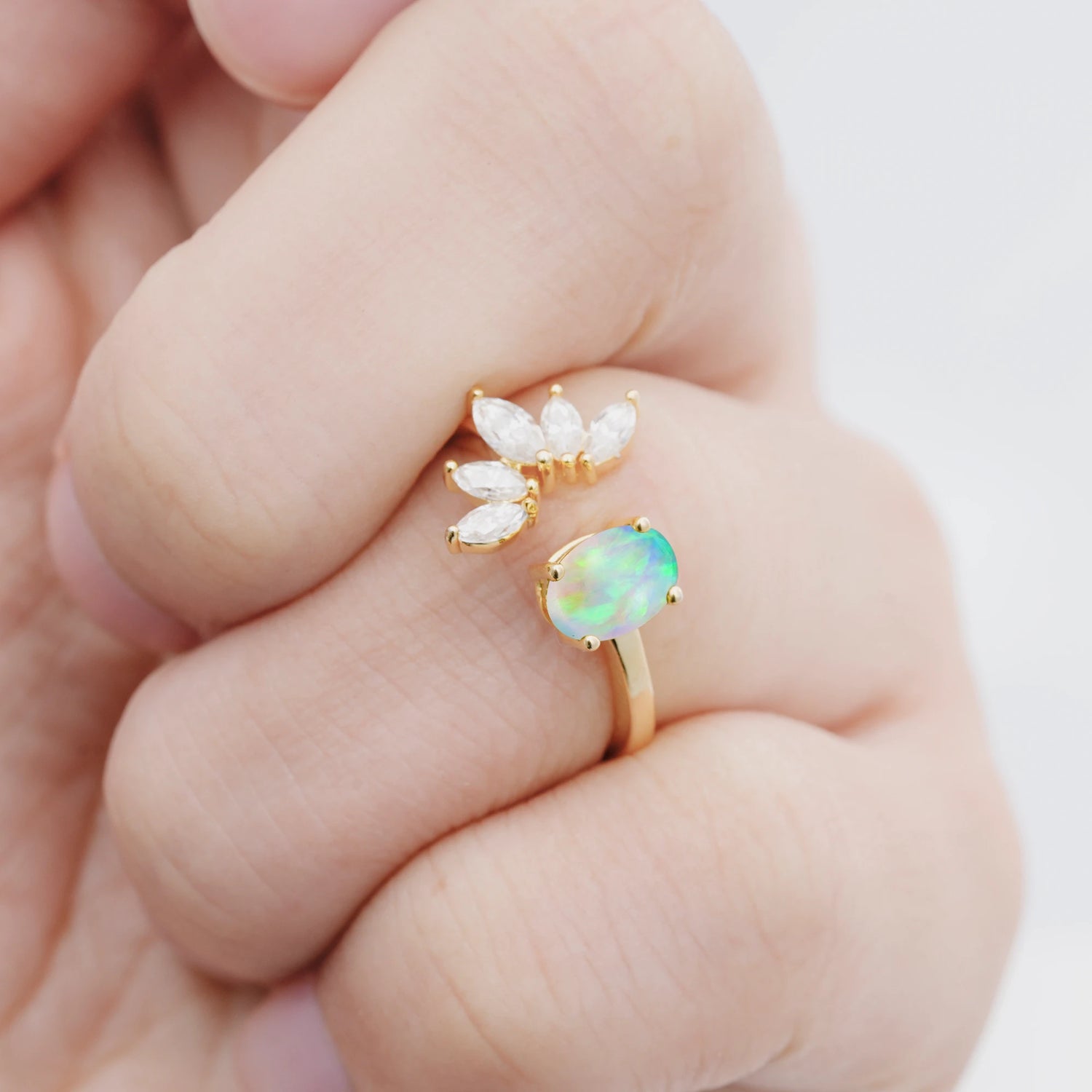 Unique Oval Opal Engagement Ring with Marquise Side Stones