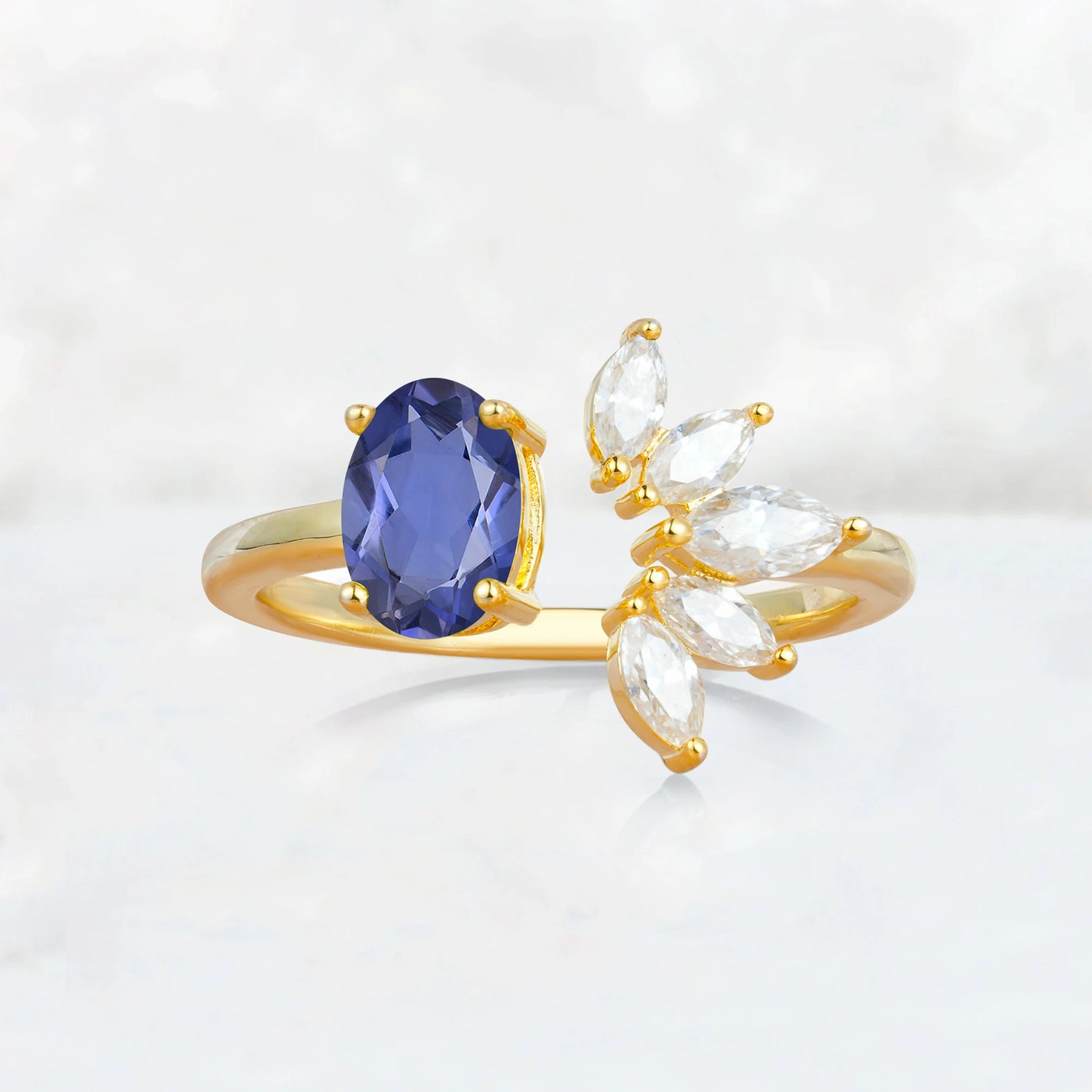 Unique Oval Tanzanite Engagement Ring with Marquise Side Stones