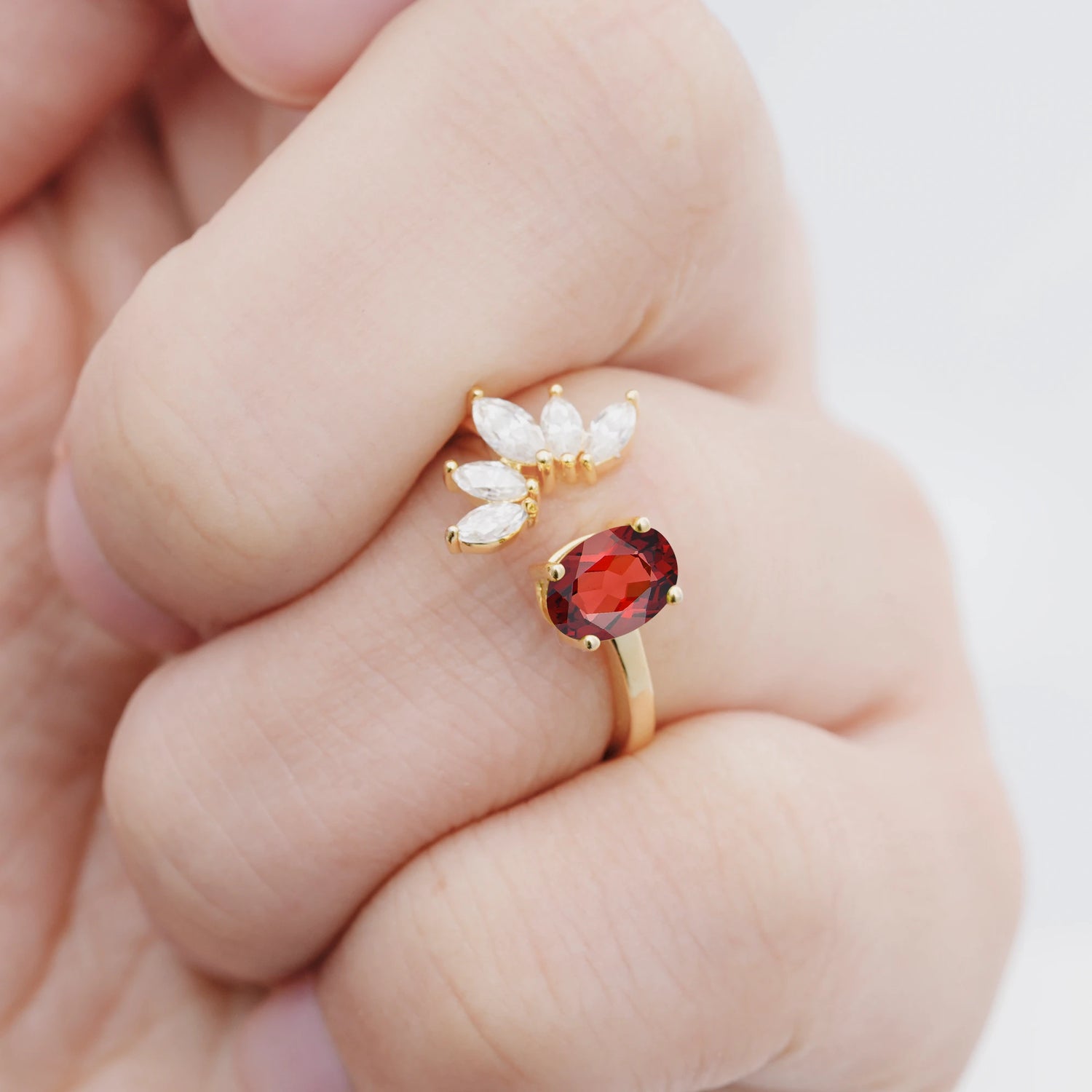 Unique Oval Garnet Engagement Ring with Marquise Side Stones