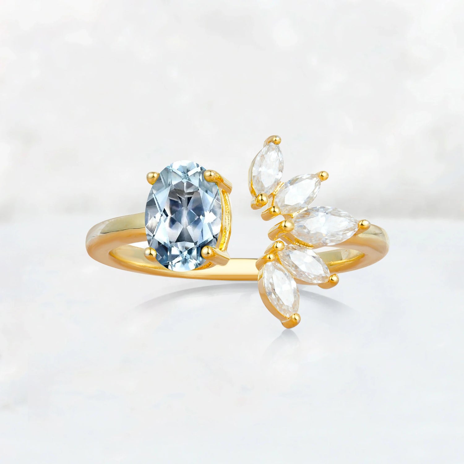 Unique Oval Aquamarine Engagement Ring with Marquise Side Stones