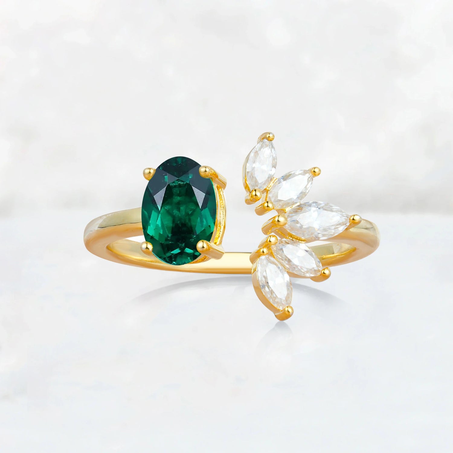 Unique Oval Emerald Engagement Ring with Marquise Side Stones