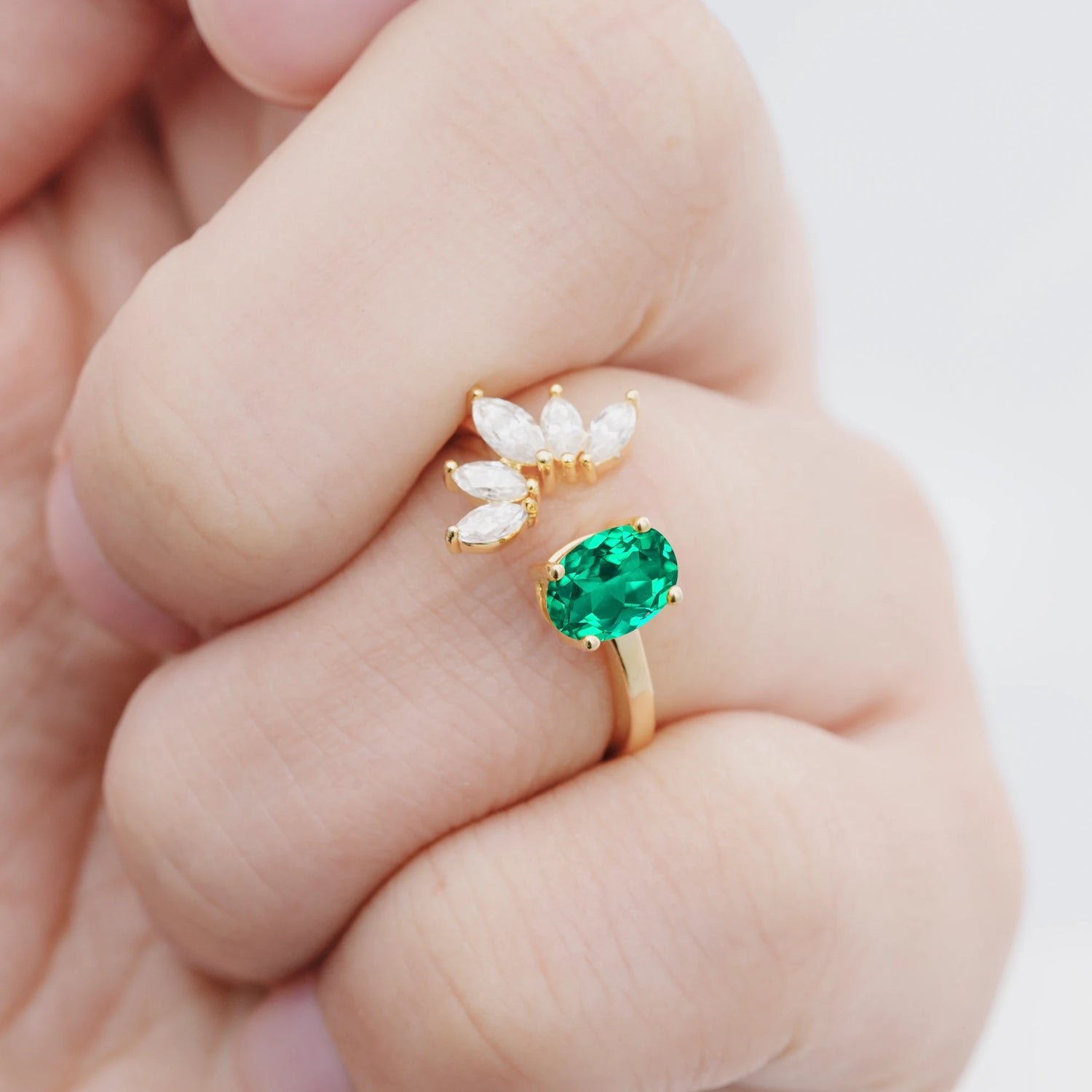 Unique Oval Emerald Engagement Ring with Marquise Side Stones