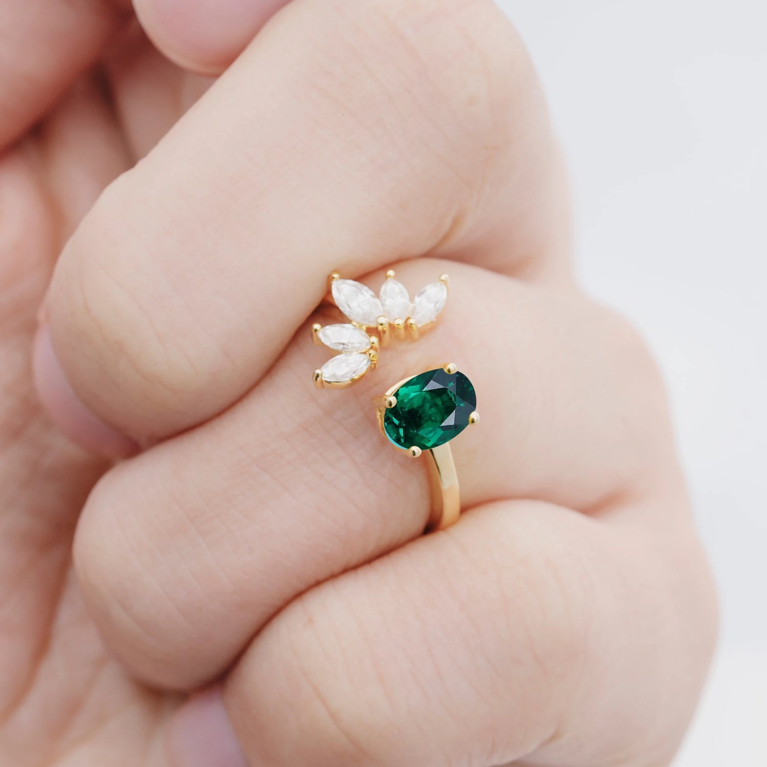 Unique Oval Emerald Engagement Ring with Marquise Side Stones