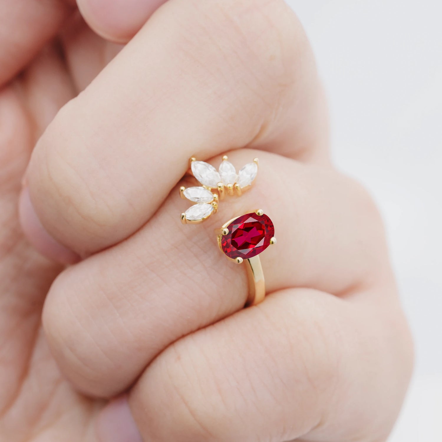 Unique Oval Ruby Engagement Ring with Marquise Side Stones