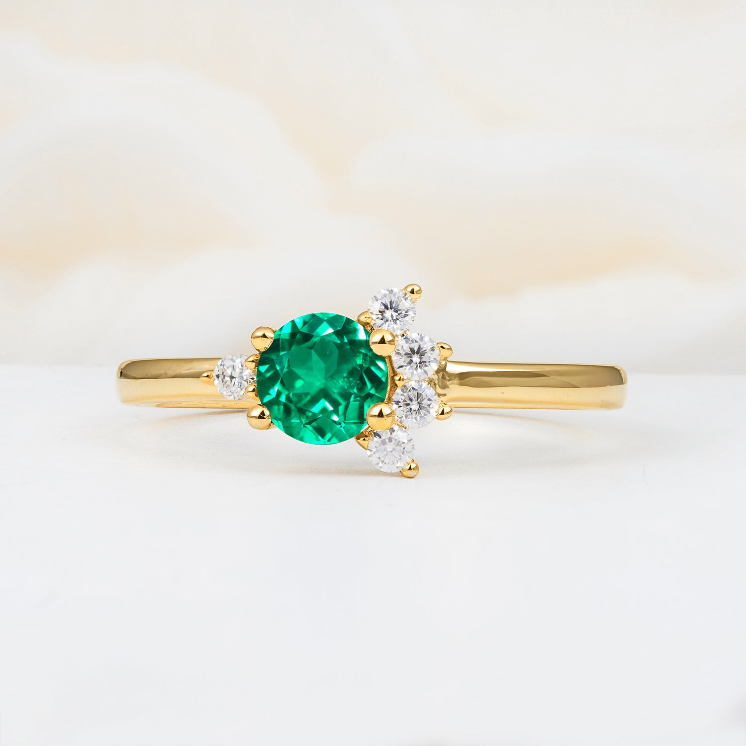 Classic Gold Leaf Emerald Engagement Ring with Oval Cut