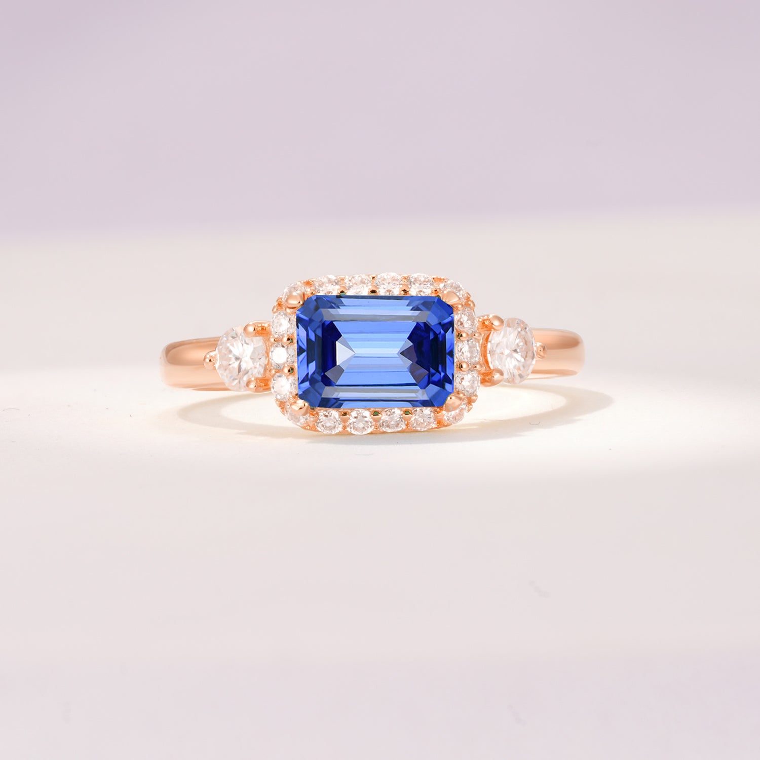 Timeless Elegance Emerald Cut Halo Sapphire Engagement Ring