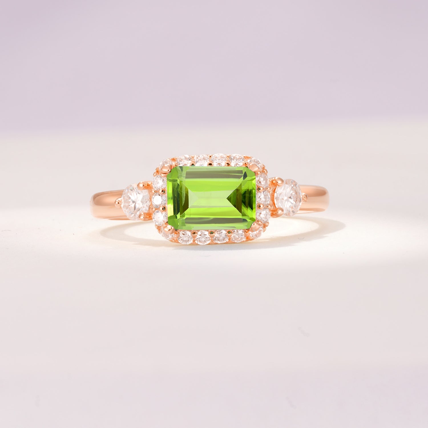 Timeless Elegance Emerald Cut Halo Peridot Engagement Ring
