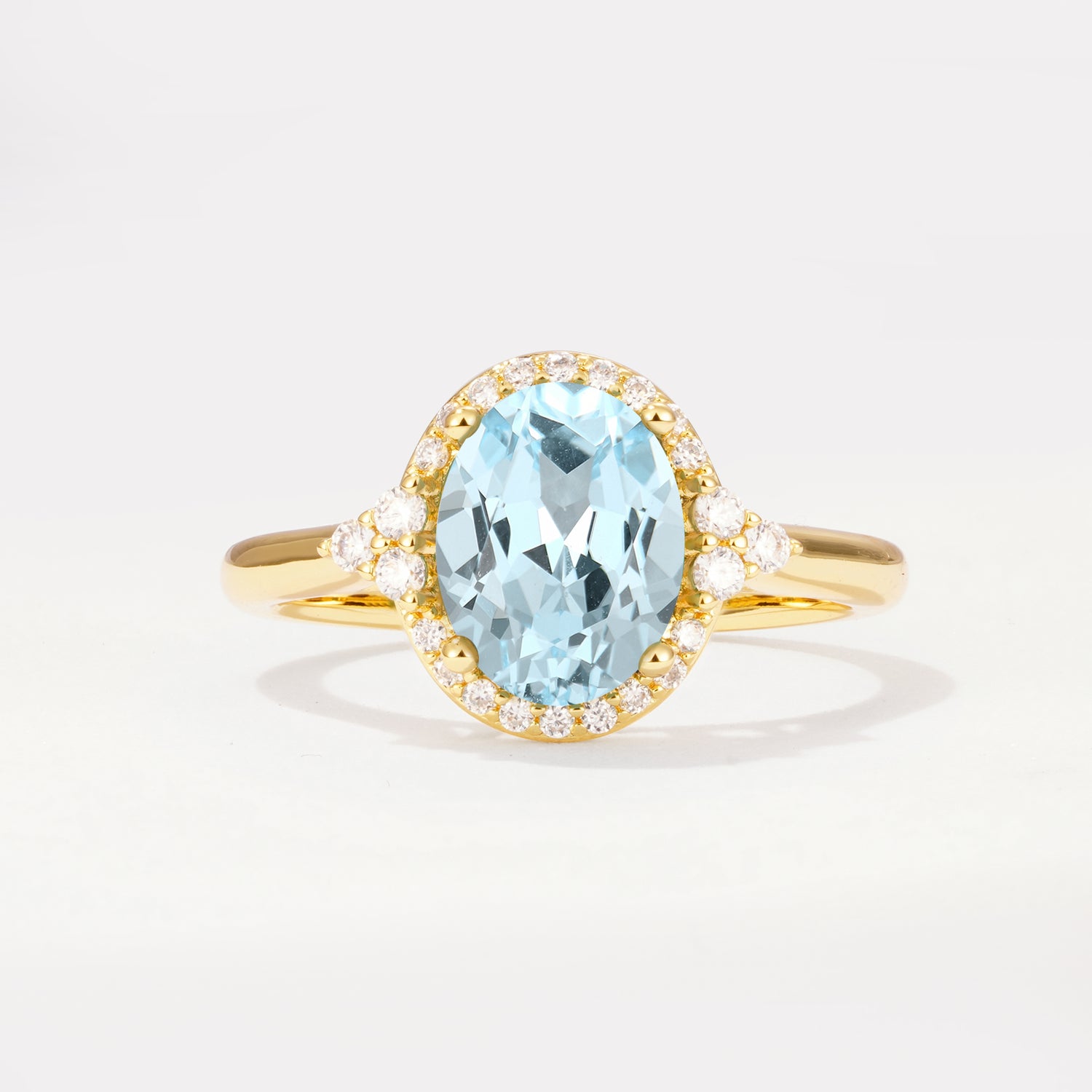 Halo Trillion Accent Oval Cut Aquamarine Engagement Ring