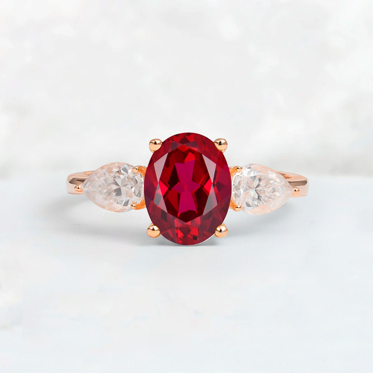Oval Cut Ruby Three-Stone Engagement Ring with Pear Side Stones - Additional view