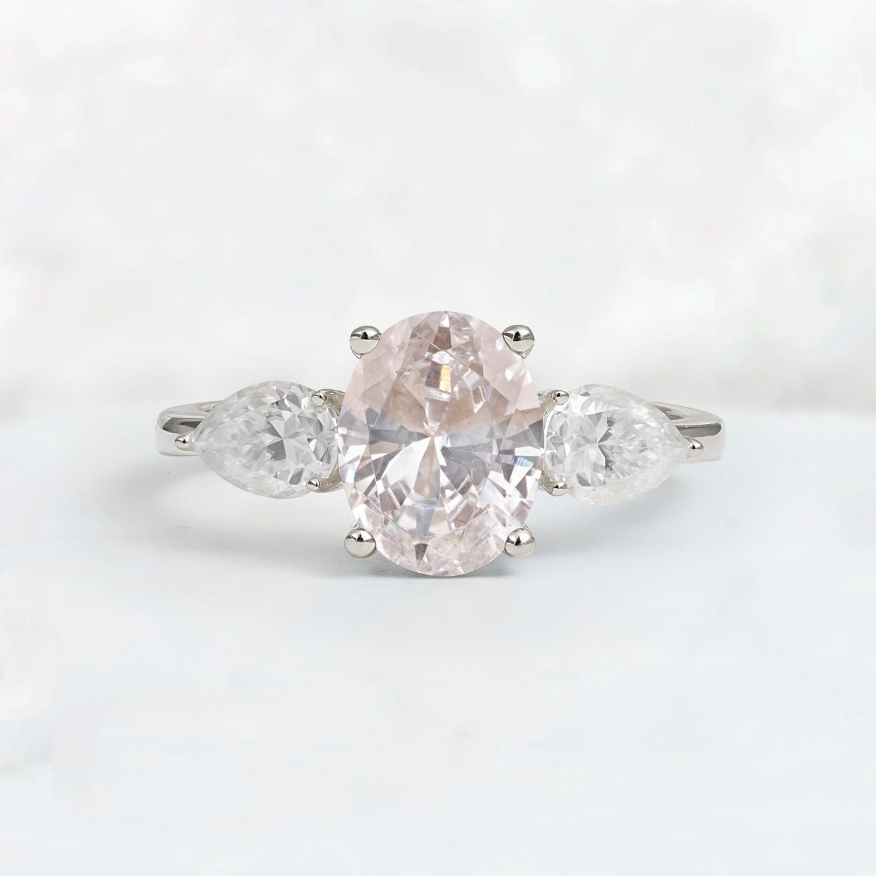 Oval Cut Moissanite Three-Stone Engagement Ring with Pear Side Stones - Additional view