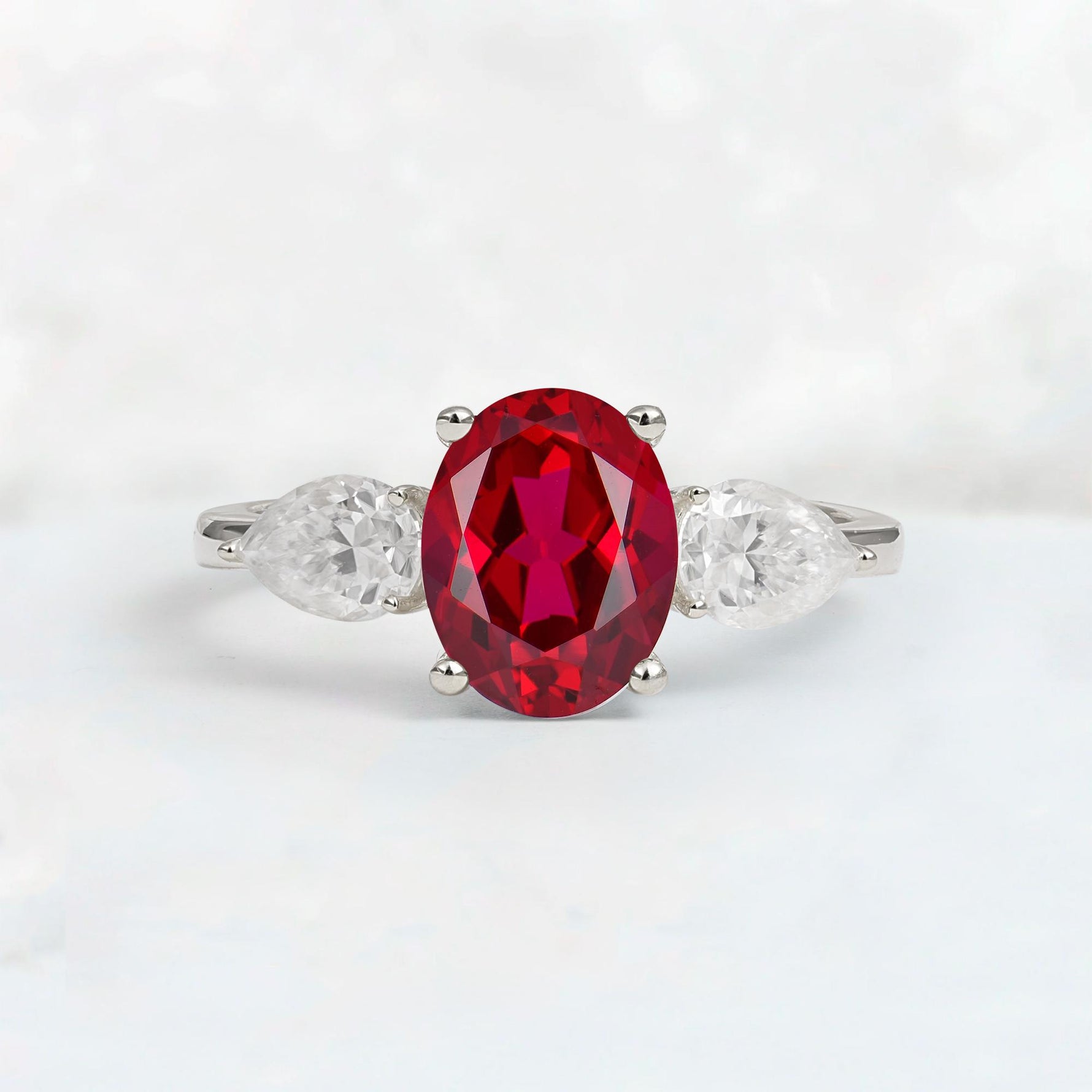 Oval Cut Ruby Three-Stone Engagement Ring with Pear Side Stones - Additional view