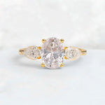 Oval Cut Moissanite Three-Stone Engagement Ring with Pear Side Stones - Additional view