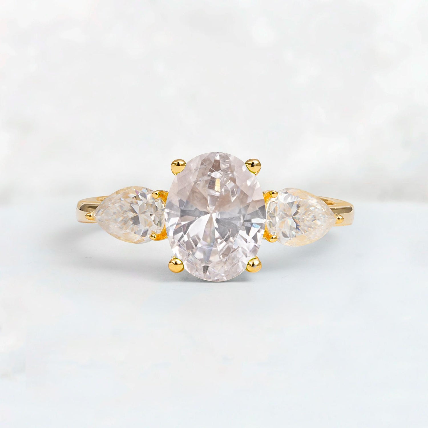 Oval Cut Moissanite Three-Stone Engagement Ring with Pear Side Stones - Additional view