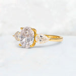 Oval Cut Moissanite Three-Stone Engagement Ring with Pear Side Stones - Additional view