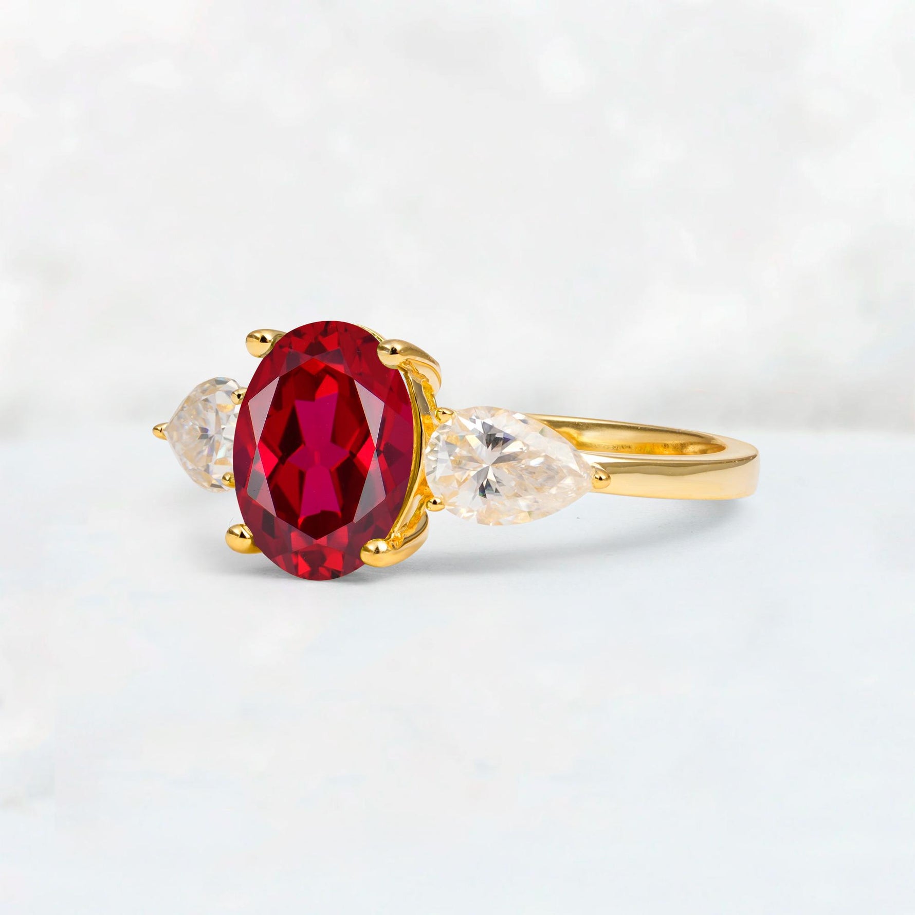 Oval Cut Ruby Three-Stone Engagement Ring with Pear Side Stones - Additional view