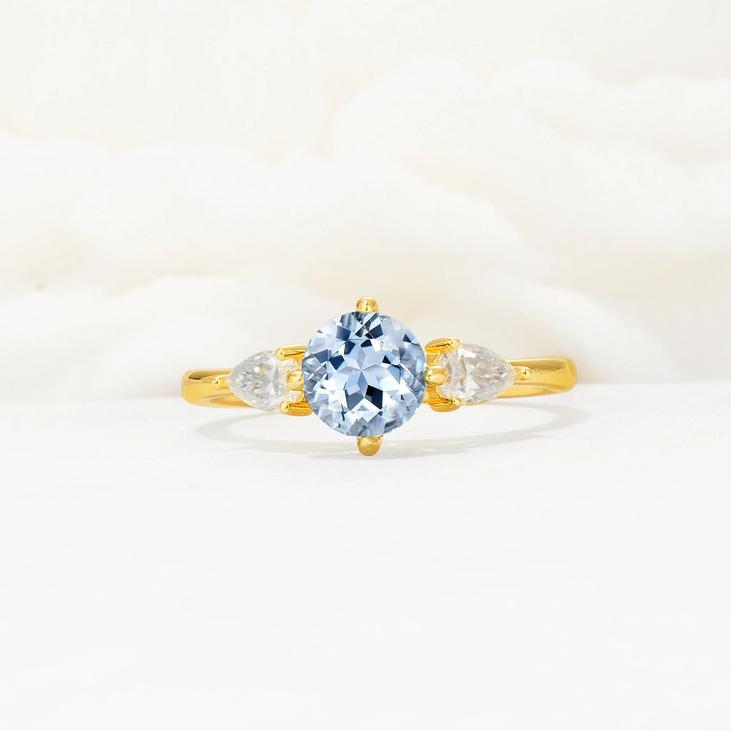 Round Cut Aquamarine Three Stone Engagement Ring