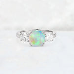 Cushion Fire Opal Round Side Stone Three-Stone Engagement Ring - Additional view