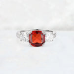 Cushion Garnet Round Side Stone Three-Stone Engagement Ring - Additional view