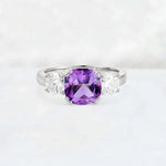 Cushion Amethyst Round Side Stone Three-Stone Engagement Ring - Additional view