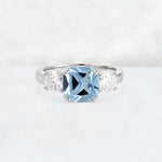 Cushion Aquamarine Round Side Stone Three-Stone Engagement Ring - Additional view