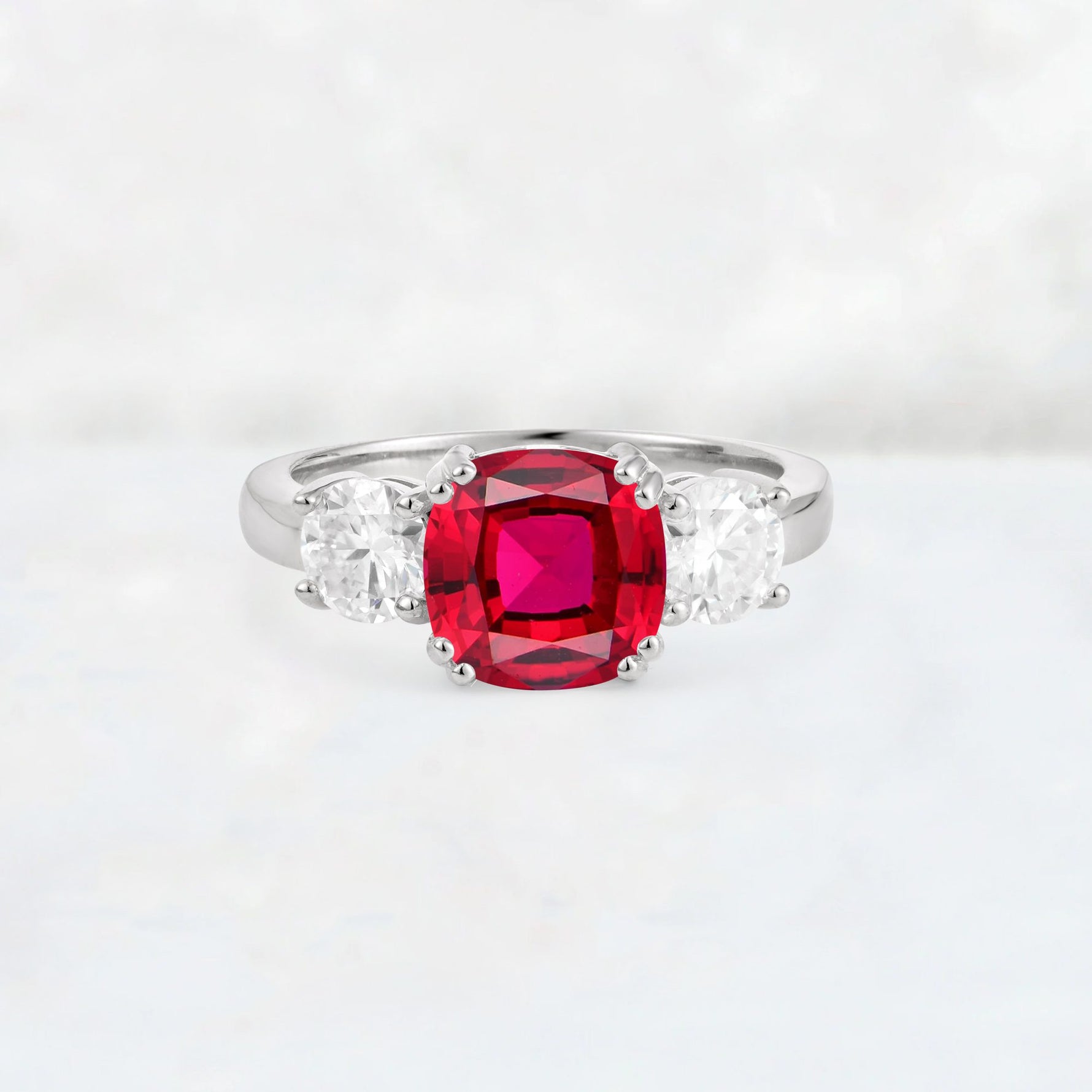 Cushion Ruby Round Side Stone Three-Stone Engagement Ring - Additional view