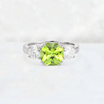 Cushion Peridot Round Side Stone Three-Stone Engagement Ring - Additional view