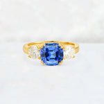 Cushion Sapphire Round Side Stone Three-Stone Engagement Ring - Additional view