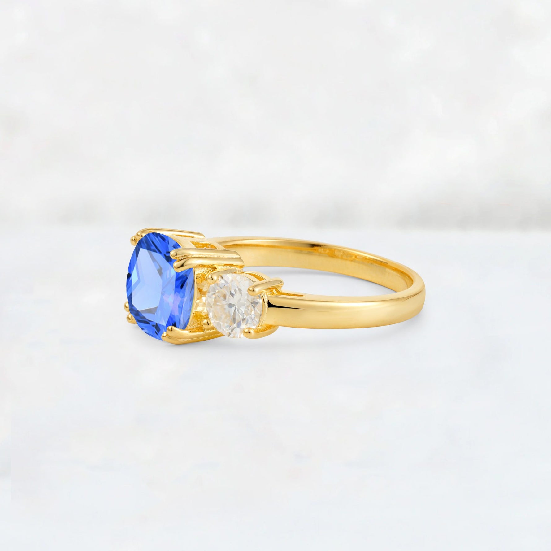 Cushion Sapphire Round Side Stone Three-Stone Engagement Ring - Additional view