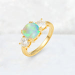 Cushion Fire Opal Round Side Stone Three-Stone Engagement Ring - Additional view